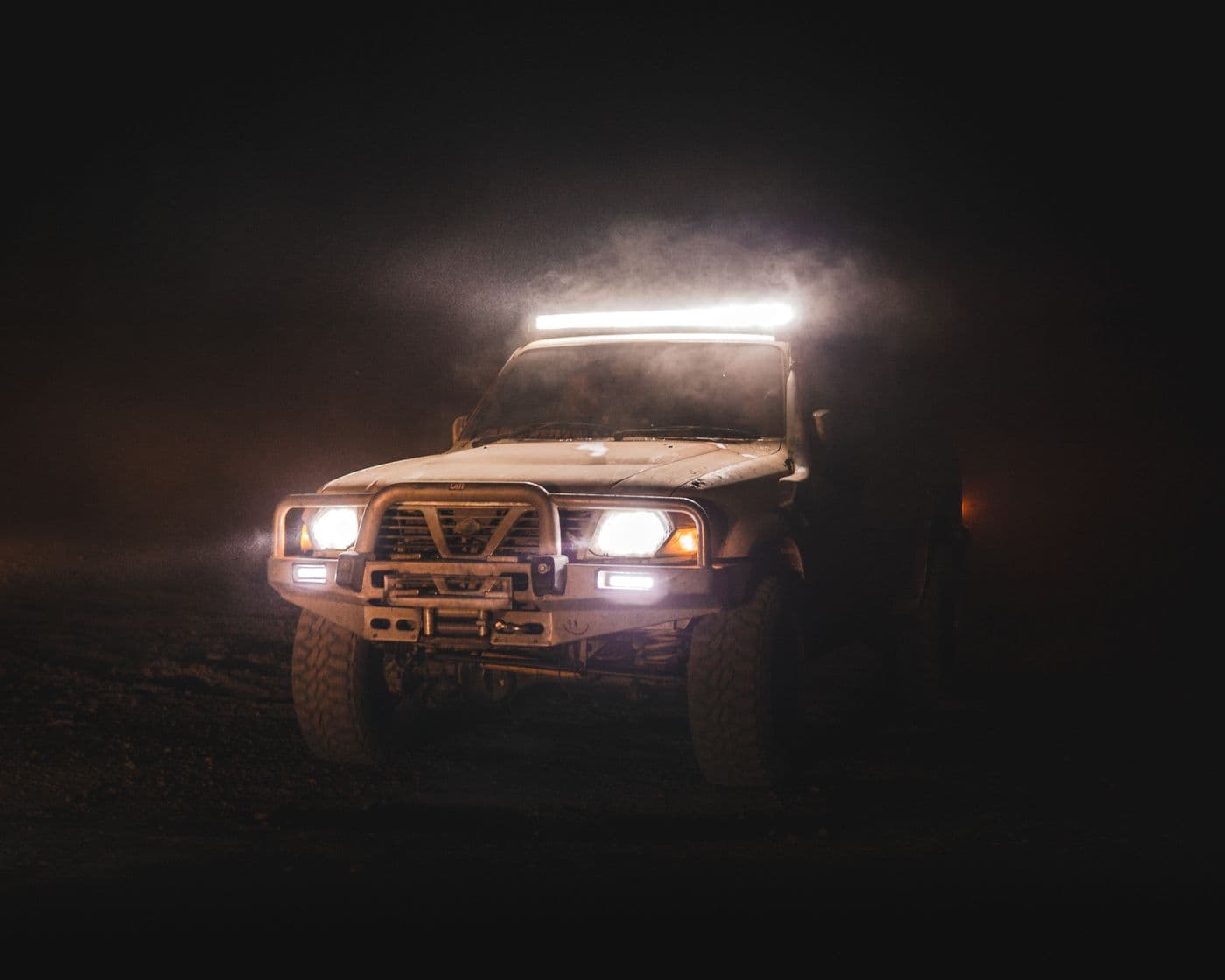 Truck with an LED light bar lit at night